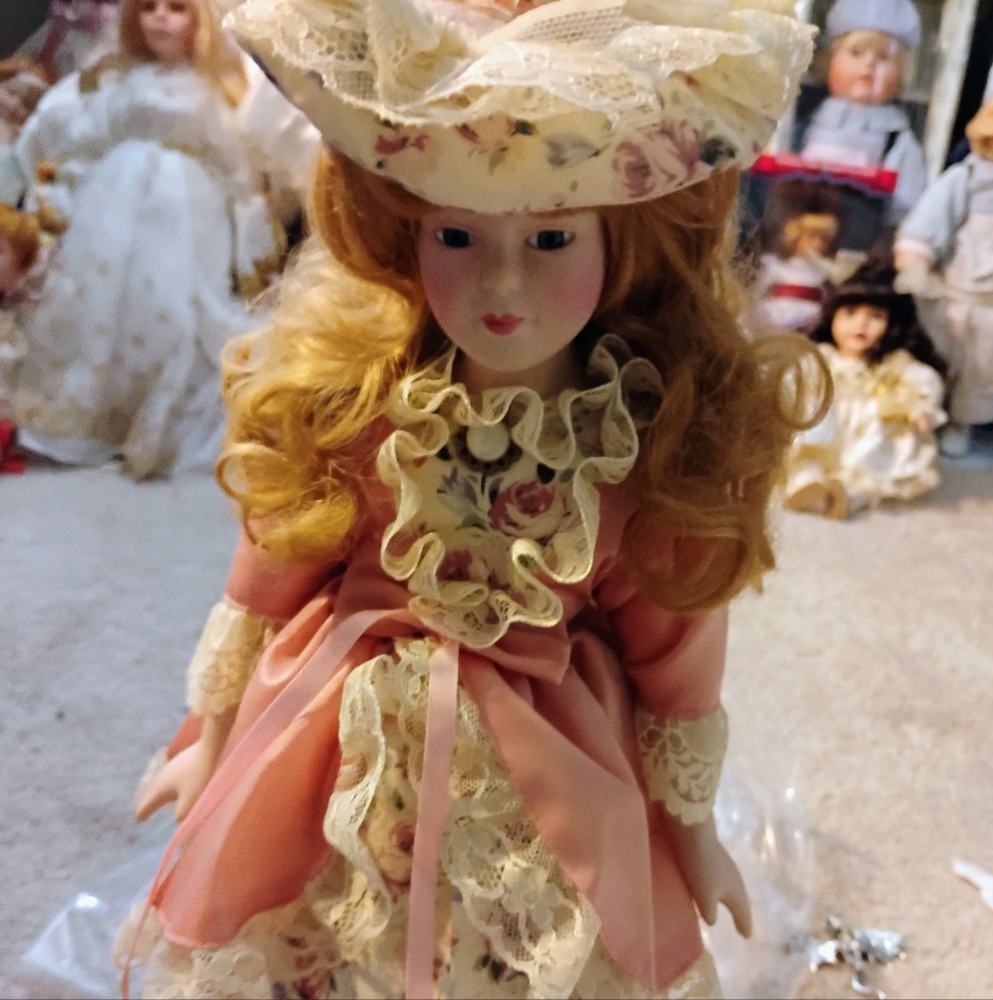 Elegant Pink Porcelain Doll with Floral Dress